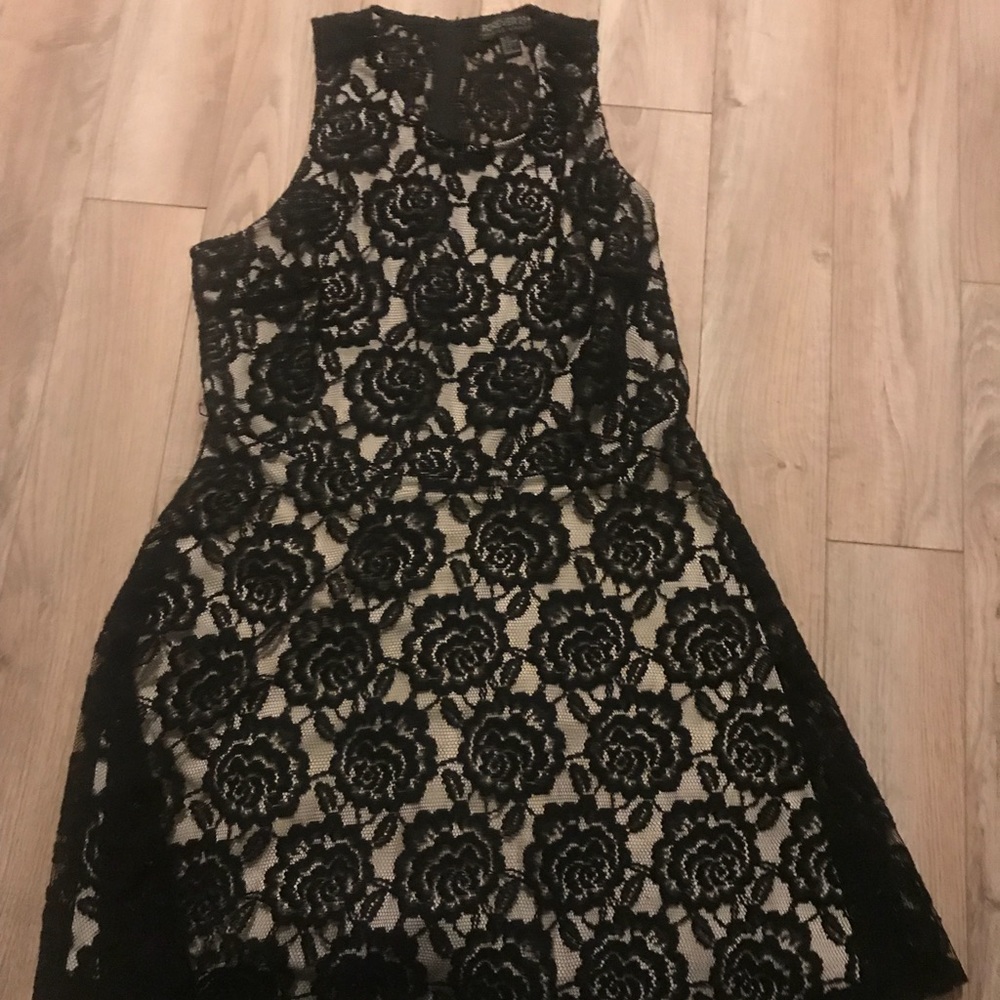 Beautiful black and nude above the knee dress